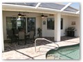 The huge lanai under roof will spend shade, on the roof you can see the solar heater for the pool...
