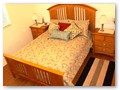 The queen suite also has the cherry hardwood flooring...
